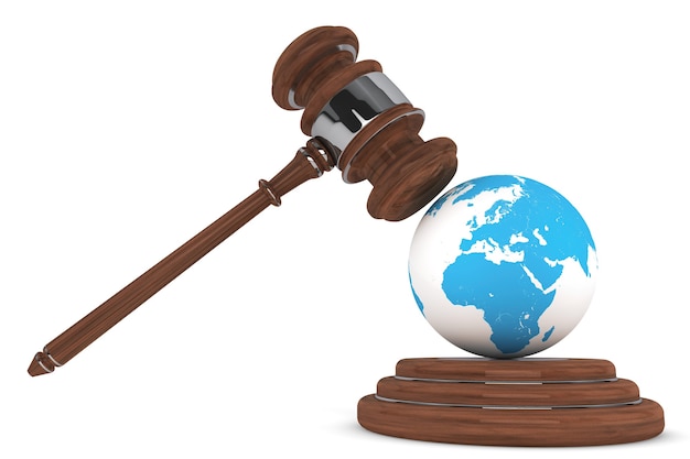 Photo justice gavel with earth globe on a white background