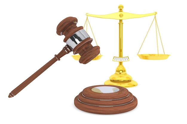 Justice gold scale and wooden gavel on a white background