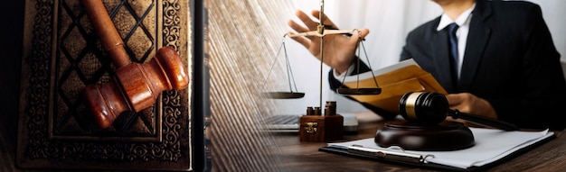 Justice and law conceptMale judge in a courtroom with the gavel working with computer and docking keyboard eyeglasses on table in morning light