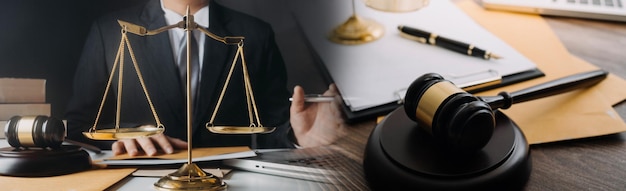 Justice and law conceptMale judge in a courtroom with the gavel working with computer and docking keyboard eyeglasses on table in morning light