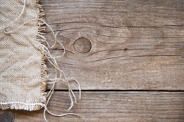 Foto jute op houten hoogste mening als achtergrond met exemplaarruimte