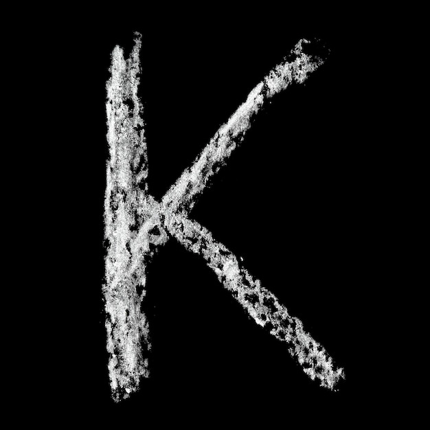 K Chalc alphabet over black background