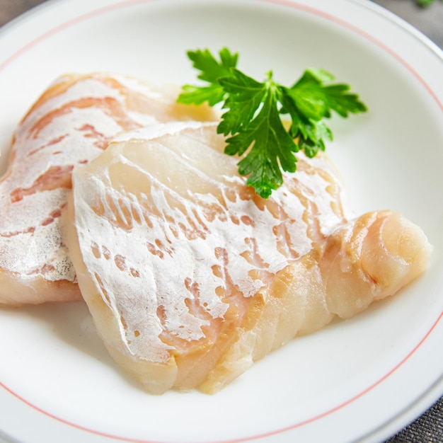 kabeljauw vis zeevruchten witte huidloze filet verse maaltijd eten snack op tafel kopieer ruimte eten