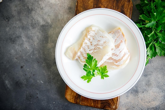 kabeljauw wit visfilet vers gezond maaltijd eten snack dieet op tafel kopieer ruimte voedsel achtergrond