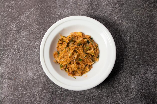 Kachkola Bhorta or Kacha kola served in dish isolated on background top view of bangladesh food