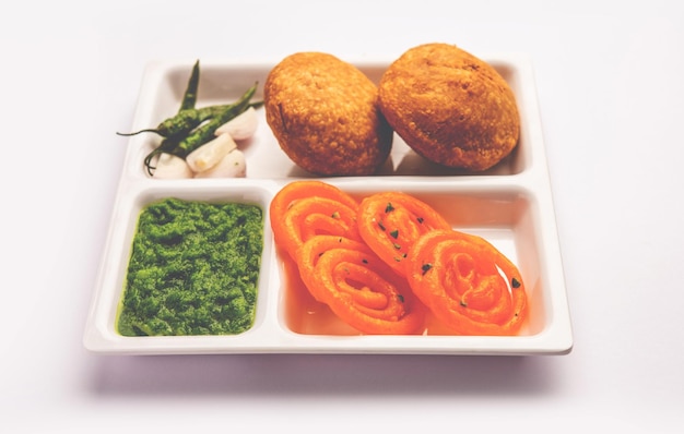 Kachori with Jalebi snack combination from India also called kachauri kachodi katchuri imarti