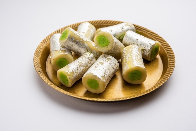 Kaju Pista Roll Or Cashew Pistachio Rolls Mithai or sigar Indian sweet or dessert for festivals