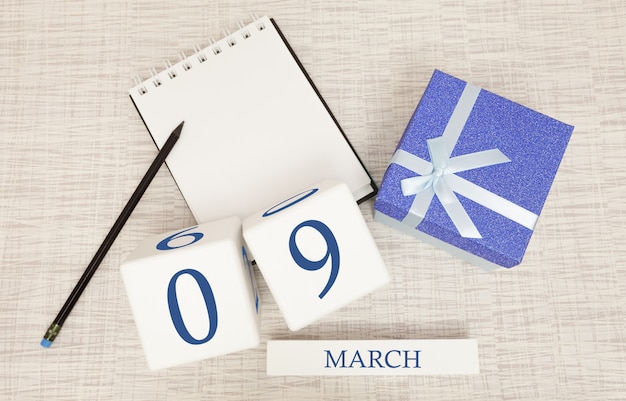 Kalender met trendy blauwe tekst en cijfers voor 9 maart