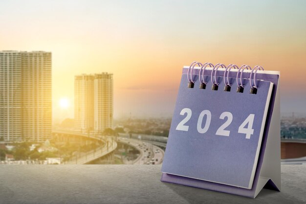 Kalender van 2024 met stadsgezichten achtergrond Gelukkig Nieuwjaar 2024