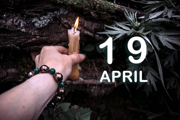 Kalenderdatum op de achtergrond van een esoterisch spiritueel ritueel 19 april is de tweeëntwintigste dag van de maand