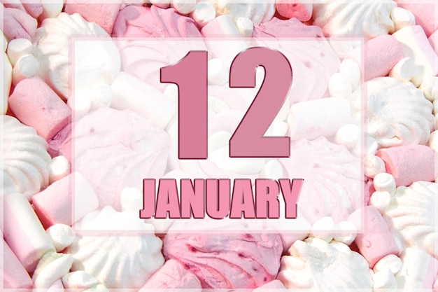 Kalenderdatum op de achtergrond van witte en roze marshmallows 12 januari is de twaalfde dag van de maand