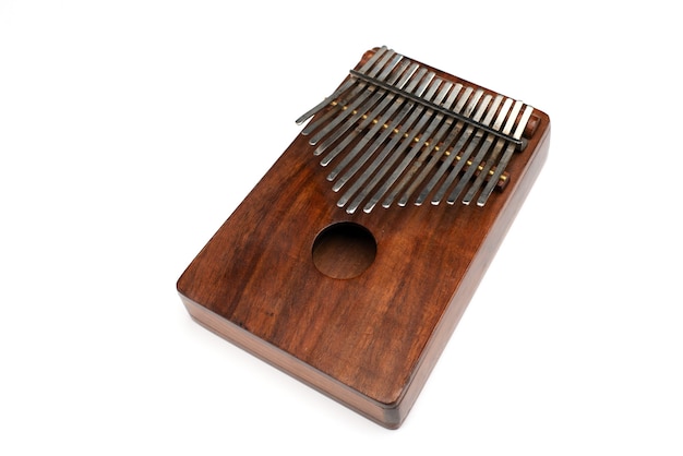 Kalimba or mbira is an African musical instrument Kalimba made from wooden board with metal  isolat