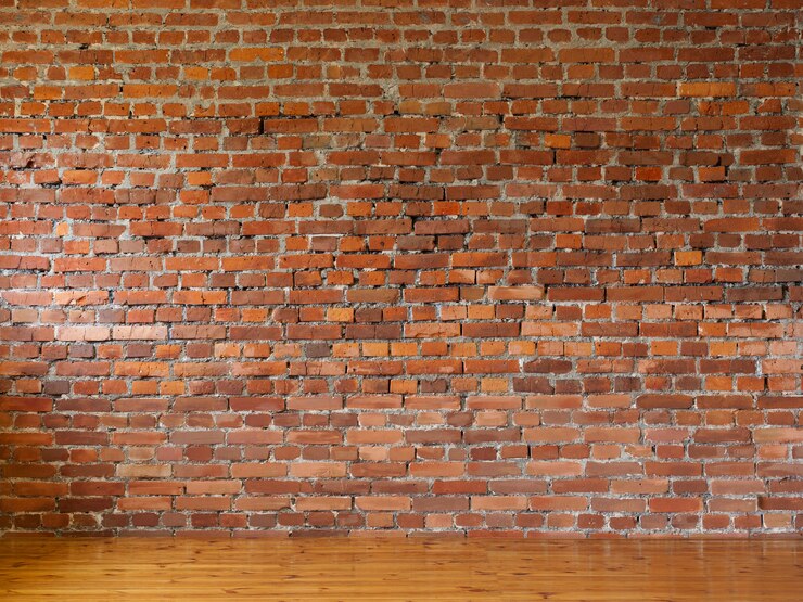 Foto kamer met rode bakstenen muren en houten vloeren van planken