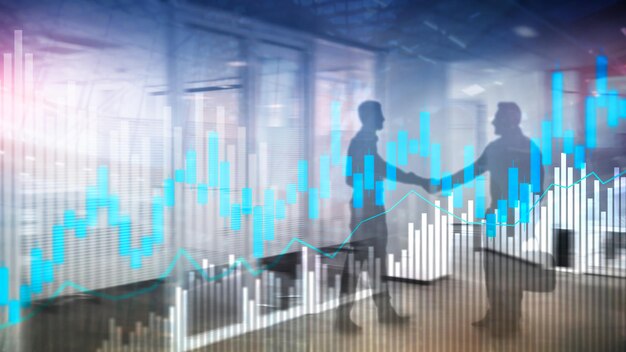 Kandelaargrafiek en diagrammen voor aandelenhandel op de wazige achtergrond van het kantoorcentrum
