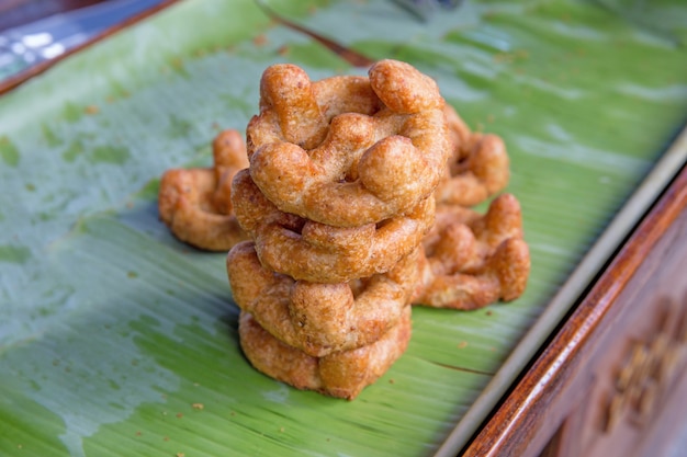 Kanom Gong snack on banana leaf