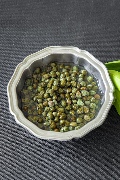 kappertjes verse gezonde maaltijd voedsel snack dieet op tafel kopieer ruimte voedsel achtergrond rustiek