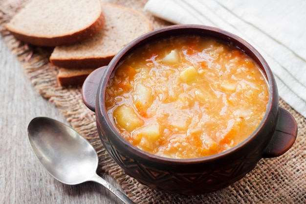 Kapustnyak - traditional Ukrainian winter soup with sauerkraut, millet and meat