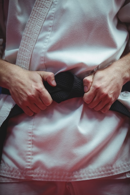 Karate player in black belt