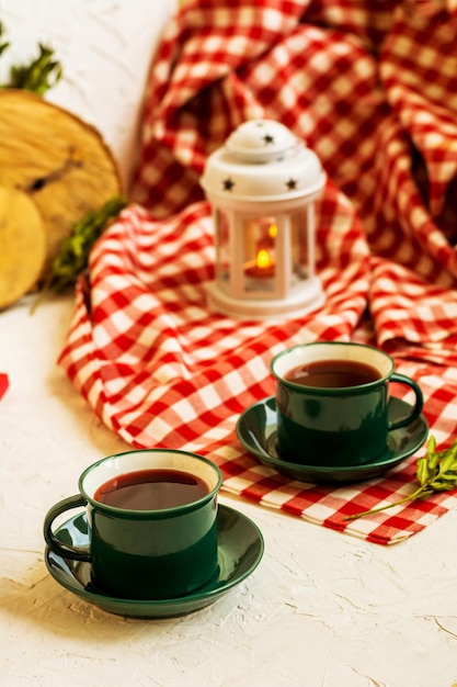 Karkade red tea in a green cup