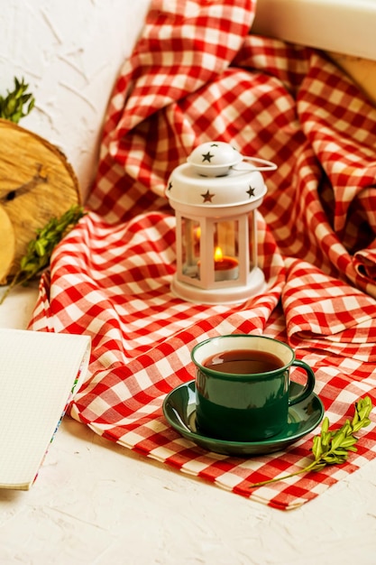 Karkade red tea in a green cup