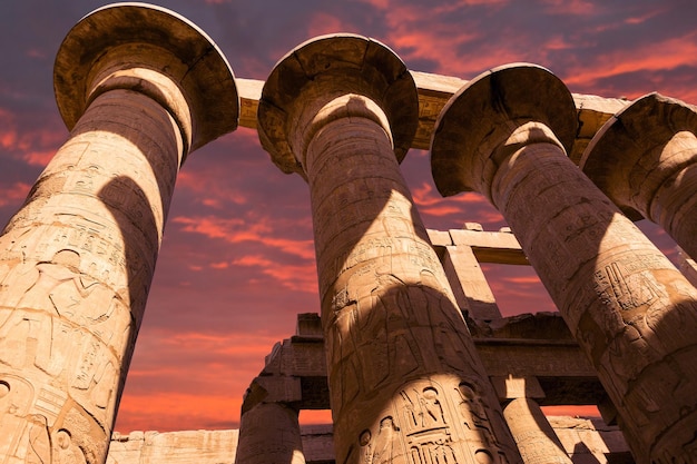 Karnak Temple Colossal sculptures of ancient Egypt in the Nile Valley in Luxor Embossed hieroglyphs on the wallx9