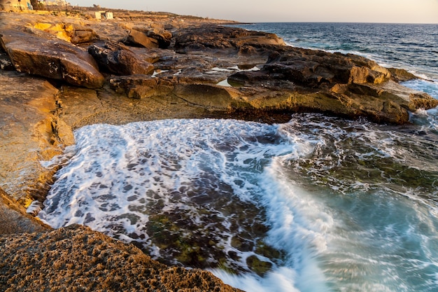 Karst rock formation on the coast of the island of Gozo Malta