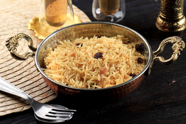 Kashmiri Pulao Made of Long Grain Basmati Rice Cooked with Spices and Flavored with Saffron