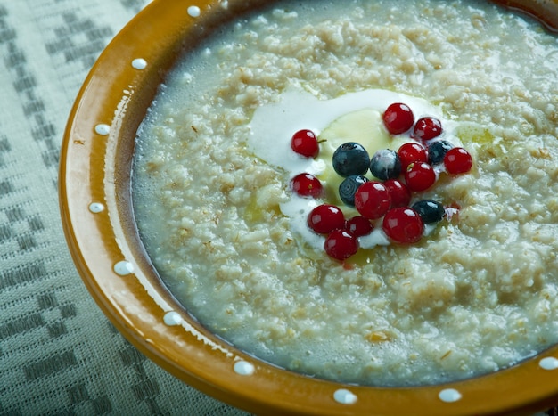 Kaurapuuro  - oatmeal in the Finnish style with butter and berries