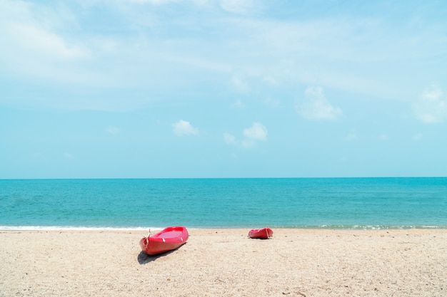 The kayak and canoe on the beach