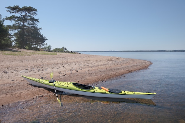 Kayak moored to the shore. Picturesque location