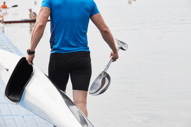 Kayaker with boat and paddle