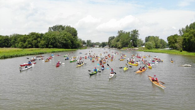 Photo kayakers paddling over st-lawrence river