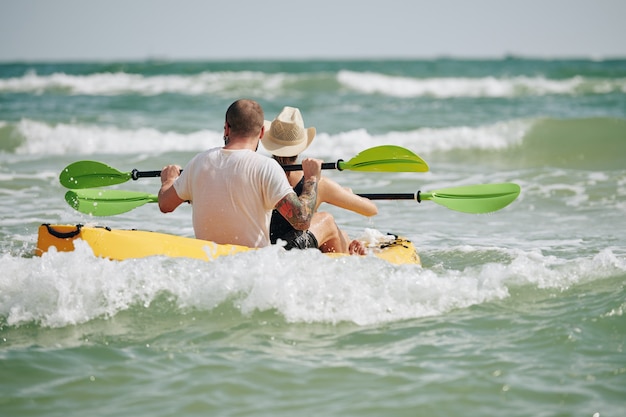 Kayaking through waves