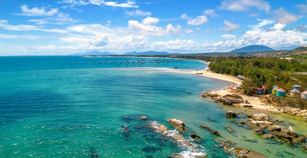 Ke Ga lighthouse is located on an island near the shore seen from above,