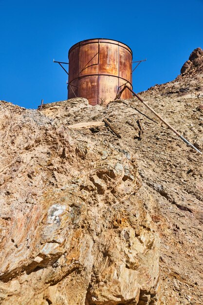 Keane wonder mine old structures at top of rocky mountains