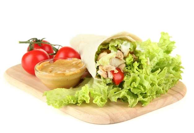 Kebab grilled meat and vegetables on wooden board isolated on white