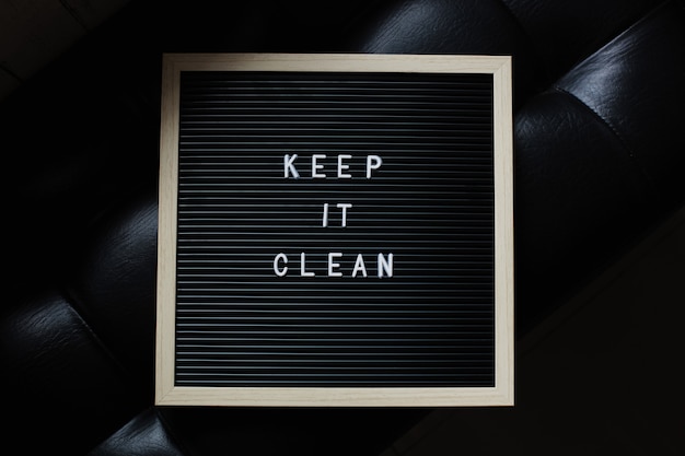 KEEP IT CLEAN letter board quote on black background
