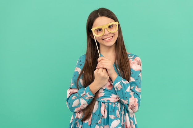 Keep smiling Happy child smile holding prop glasses Happy childhood and girlhood Enjoying disguise party Having fun