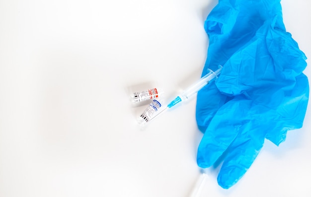 Kemerovo, Russia, July 2021. The coronavirus vaccine is in the hands of a doctor, a syringe. Coronavirus Covid 19 vaccine Sputnik V ,local name GamCovidVac, produced in Russia and ready for injection