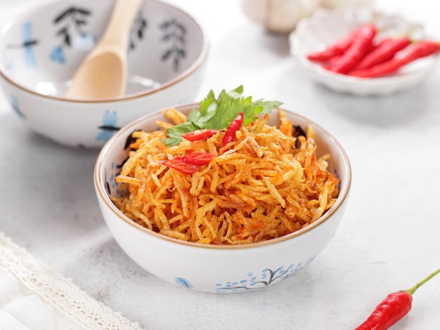kentang mustofa or spicy potato stick is an indonesian food very popular during ramadan