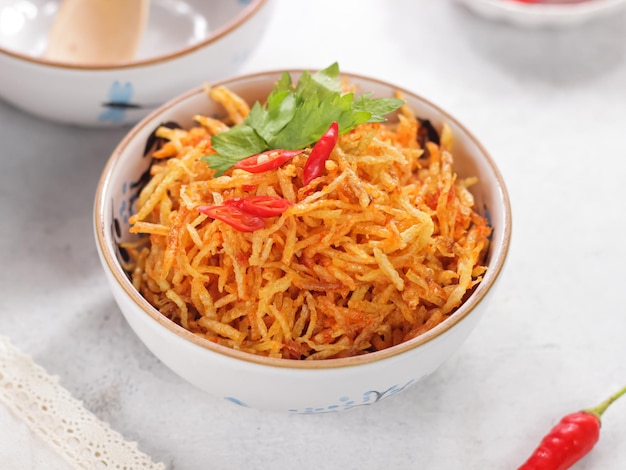 kentang mustofa or spicy potato stick is an indonesian food very popular during ramadan