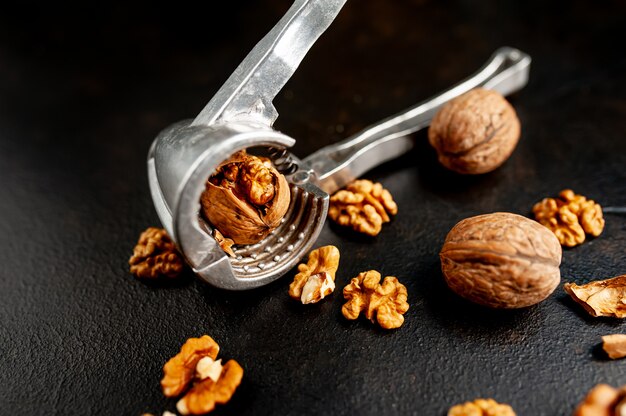 Kernels and whole nuts on a stone background