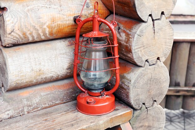 Kerosene lamp on wooden hose