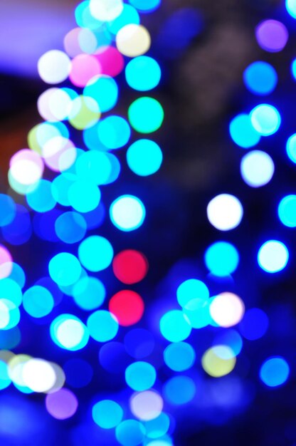 Kerst glanzend licht bokeh in blauwe kleuren