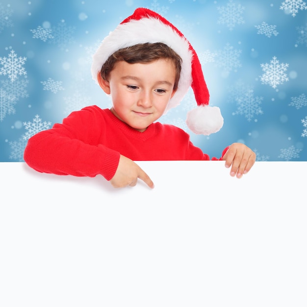 Kerst kind kind jongen Santa Claus wijzen lege banner teken copyspace