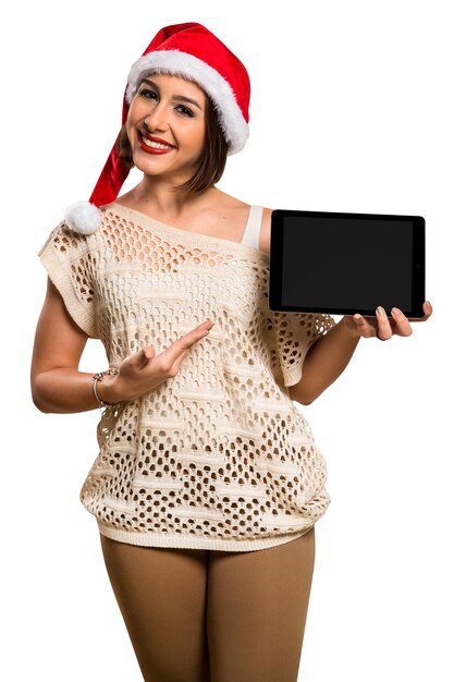 Kerst vrouw portret met tablet. Glimlachende gelukkige vrouw