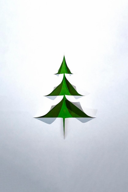 Kerstboom conceptuele papier achtergrond met kopie ruimte Vrolijk kerstfeest