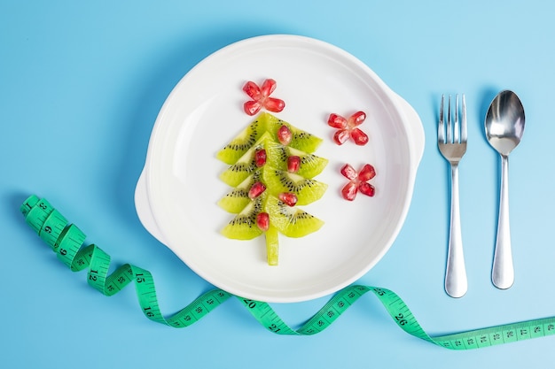 Kerstboom gemaakt van fruit