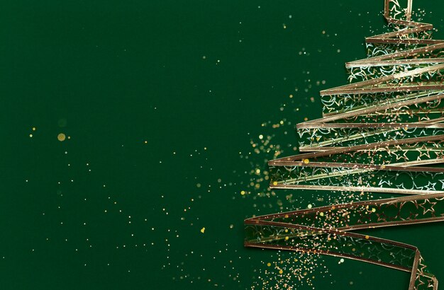 Foto kerstboom gemaakt van goud lint