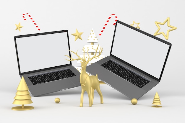 Kerstlaptops die op een witte achtergrond drijven